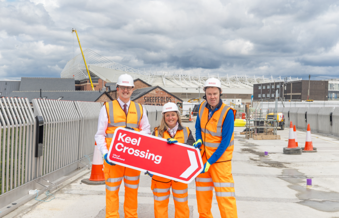 Cllr Michael Mordey, leader of Sunderland City Council with Keel Crossing sign