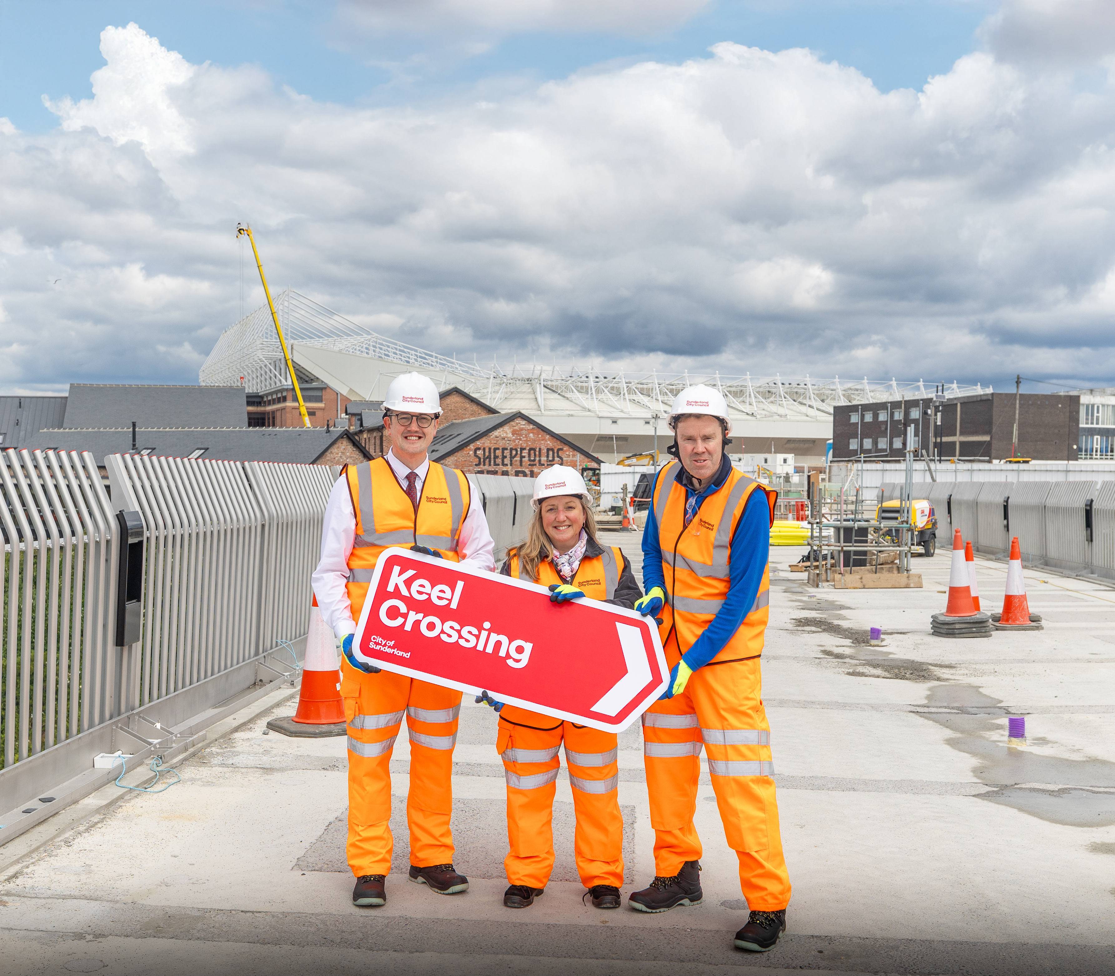 Cllr Michael Mordey, leader of Sunderland City Council with Keel Crossing sign